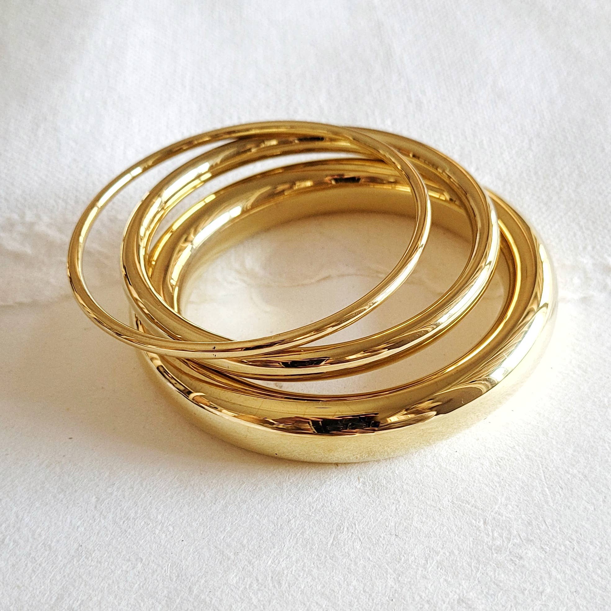 Bangle Bracelet Set offers minimalist elegance. Handmade from high-quality brass, perfect for stacking or solo wear.