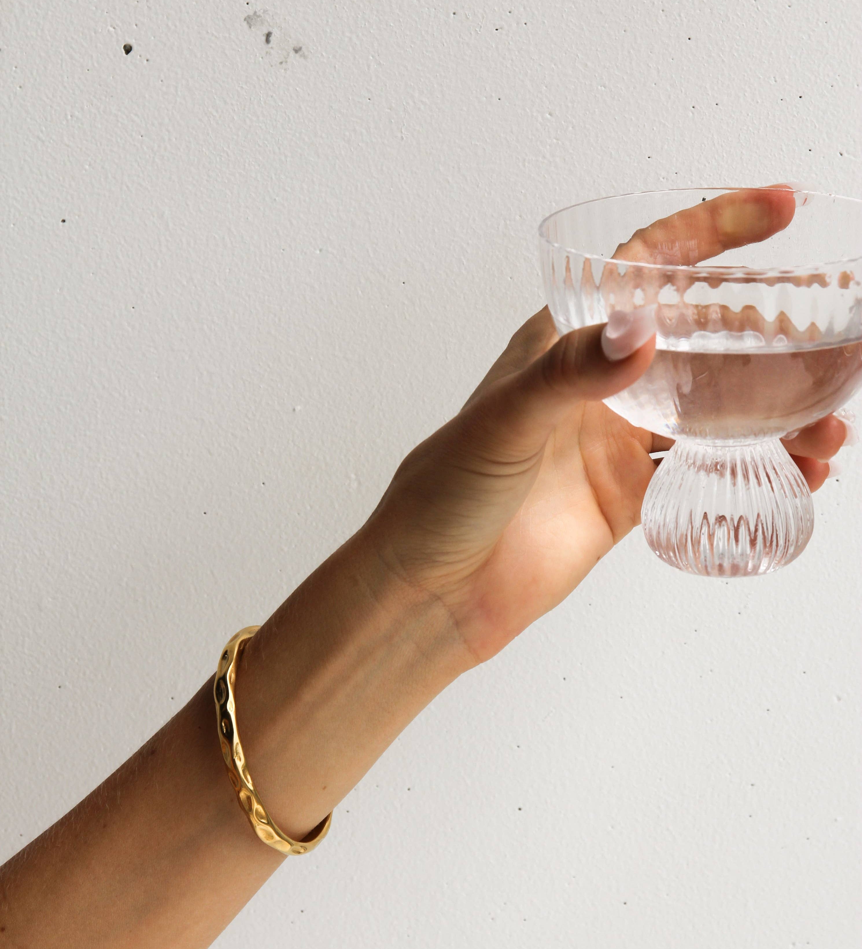 Celeste Cuff Bracelet features a refined textured design in 18K gold-plated stainless steel. Waterproof, tarnish-resistant & hypoallergenic