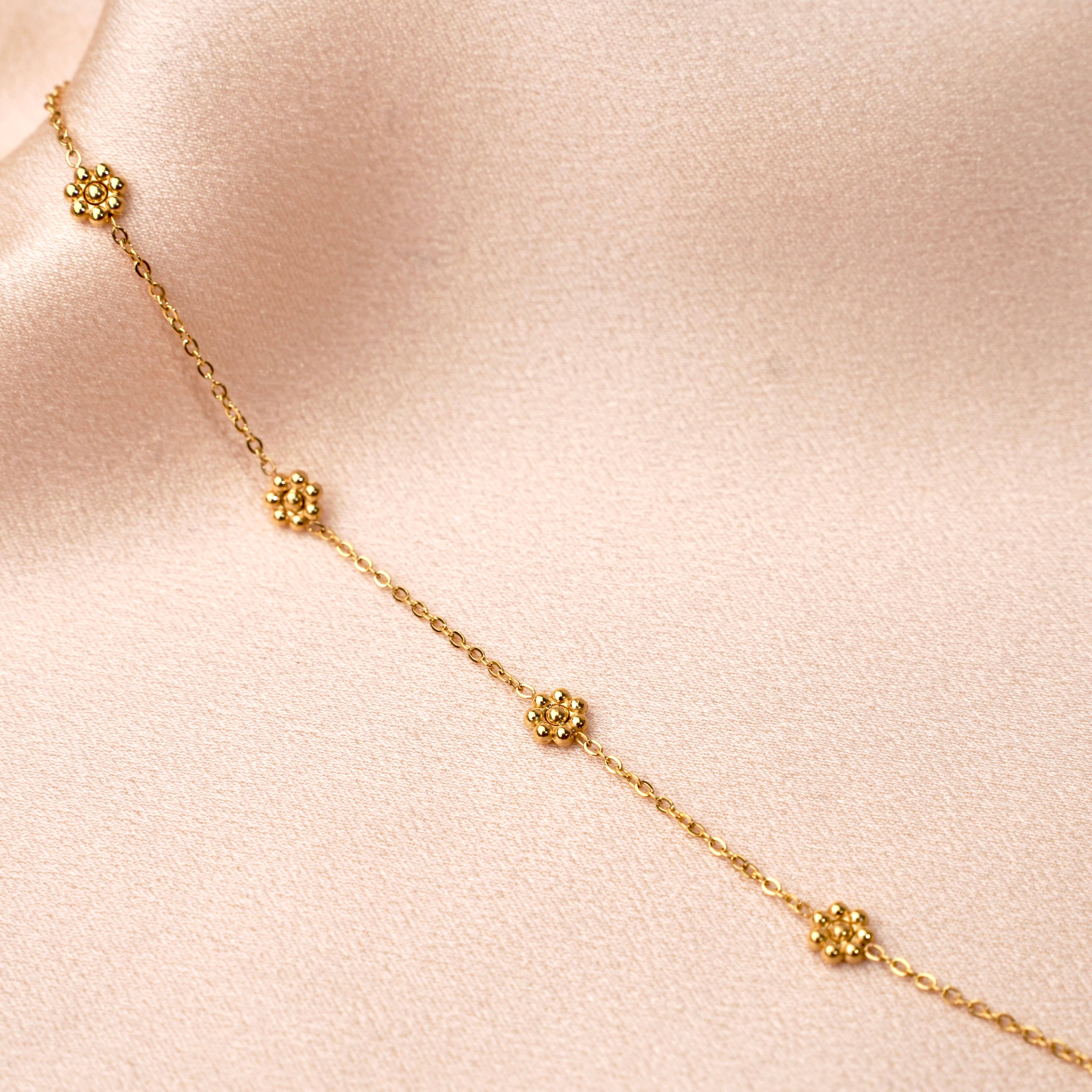 Floral Harmony Bracelet. Gold, hypoallergenic & tarnish-resistant, featuring delicate floral beads 