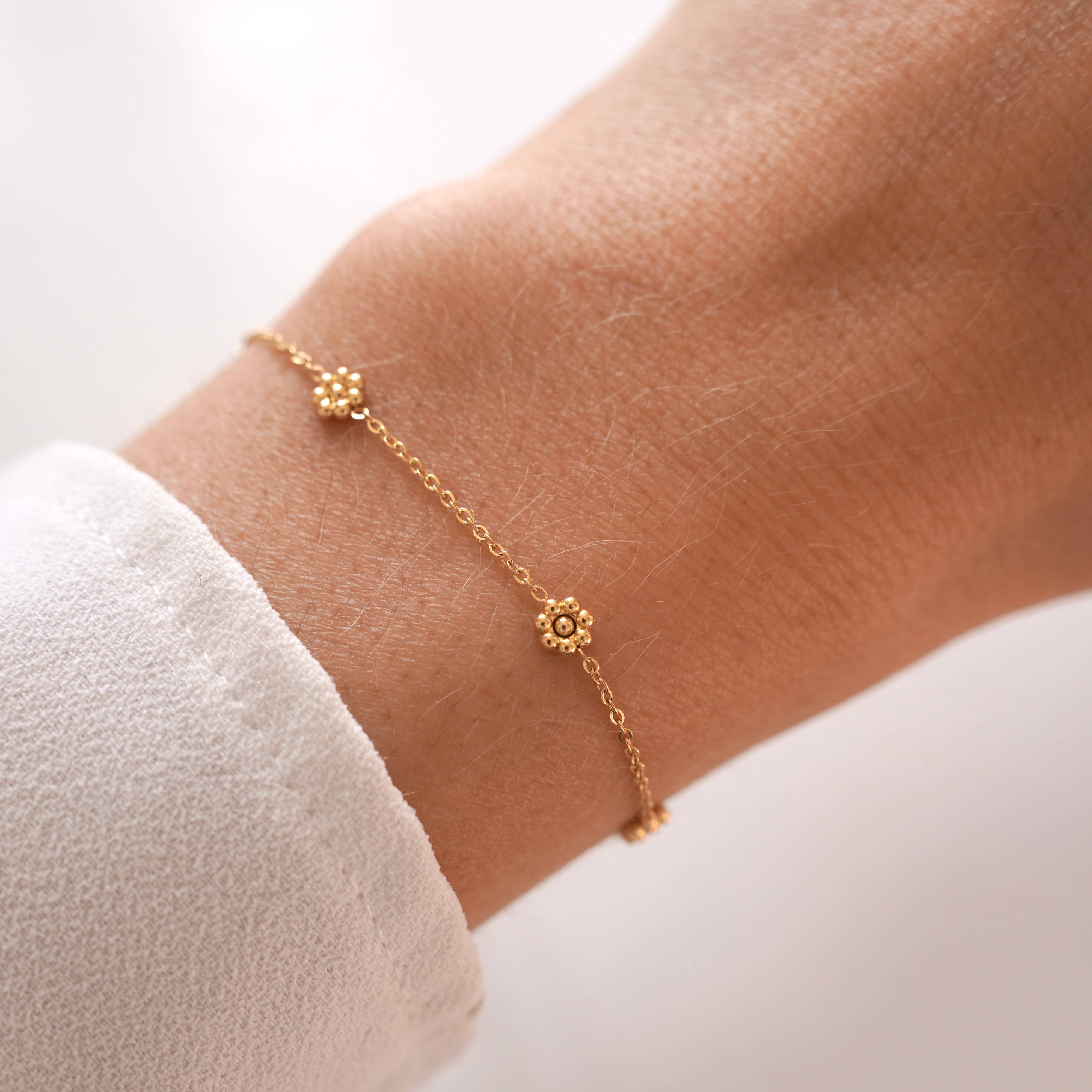 Floral Harmony Bracelet. Gold plated hypoallergenic & tarnish-resistant, featuring delicate floral beads 
