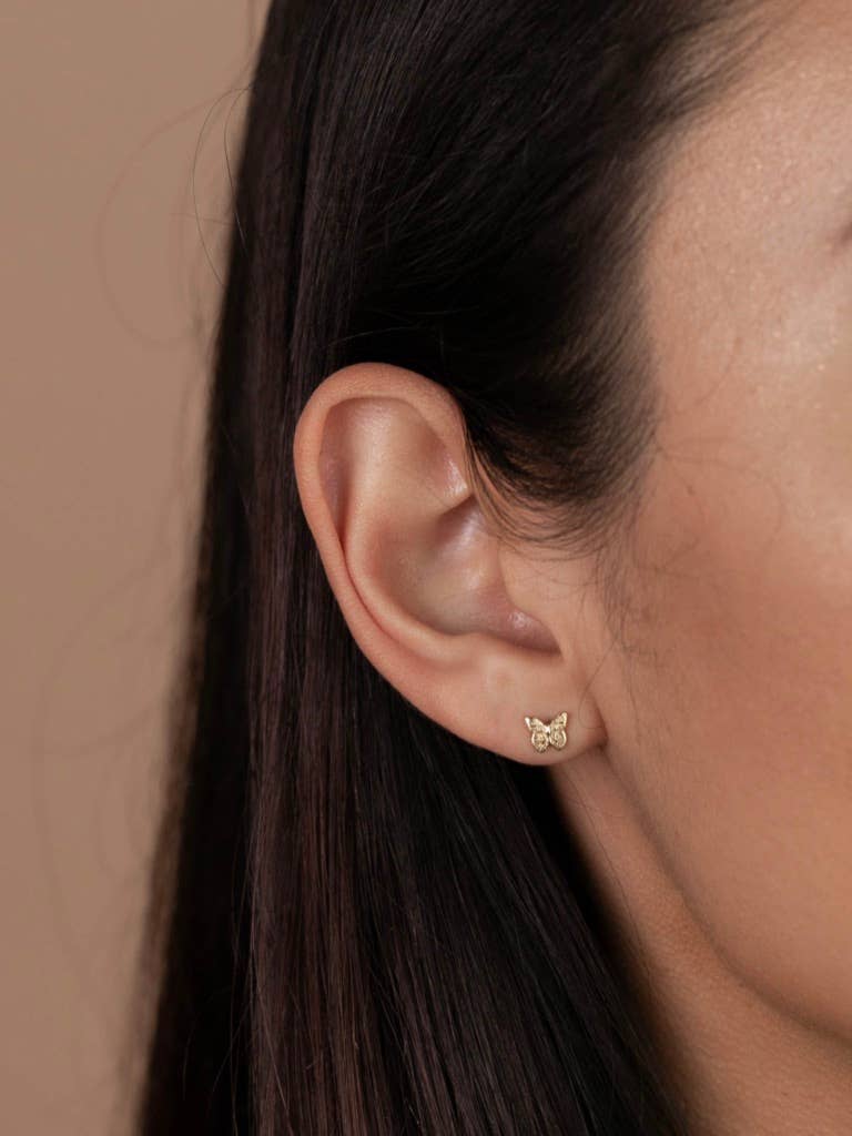 Gold Butterfly Stud Earrings add effortless elegance. 18K gold-plated, hypoallergenic & tarnish-resistant