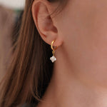  Lucky Clover Hoop Earrings. gold plated, hypoallergenic & tarnish-resistant, featuring mother-of-pearl clover pendants. 