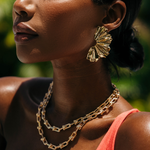 Model three wearing arabella statement earrings