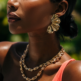 Model three wearing arabella statement earrings