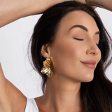 Model two wearing Arabela Statement Earrings