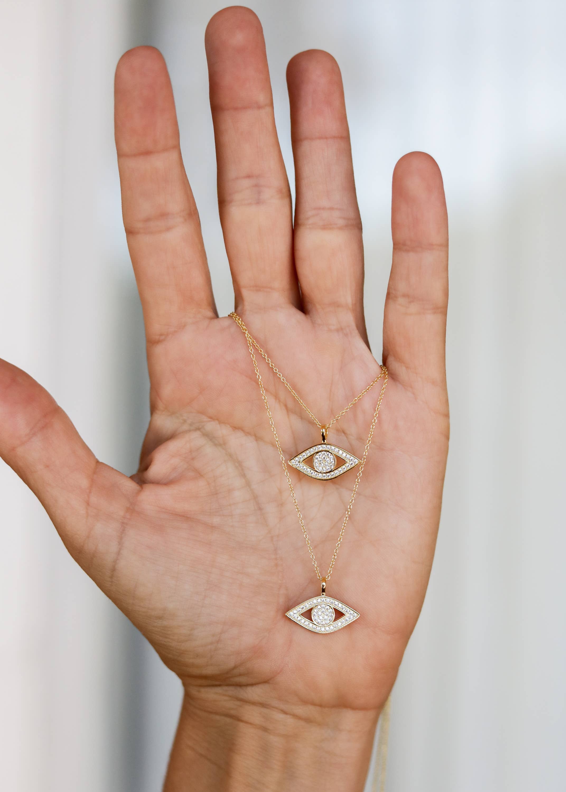 Pavé Evil Eye Necklace. Gold-plated, hypoallergenic & tarnish-resistant, featuring a CZ-encrusted charm for luck & protection