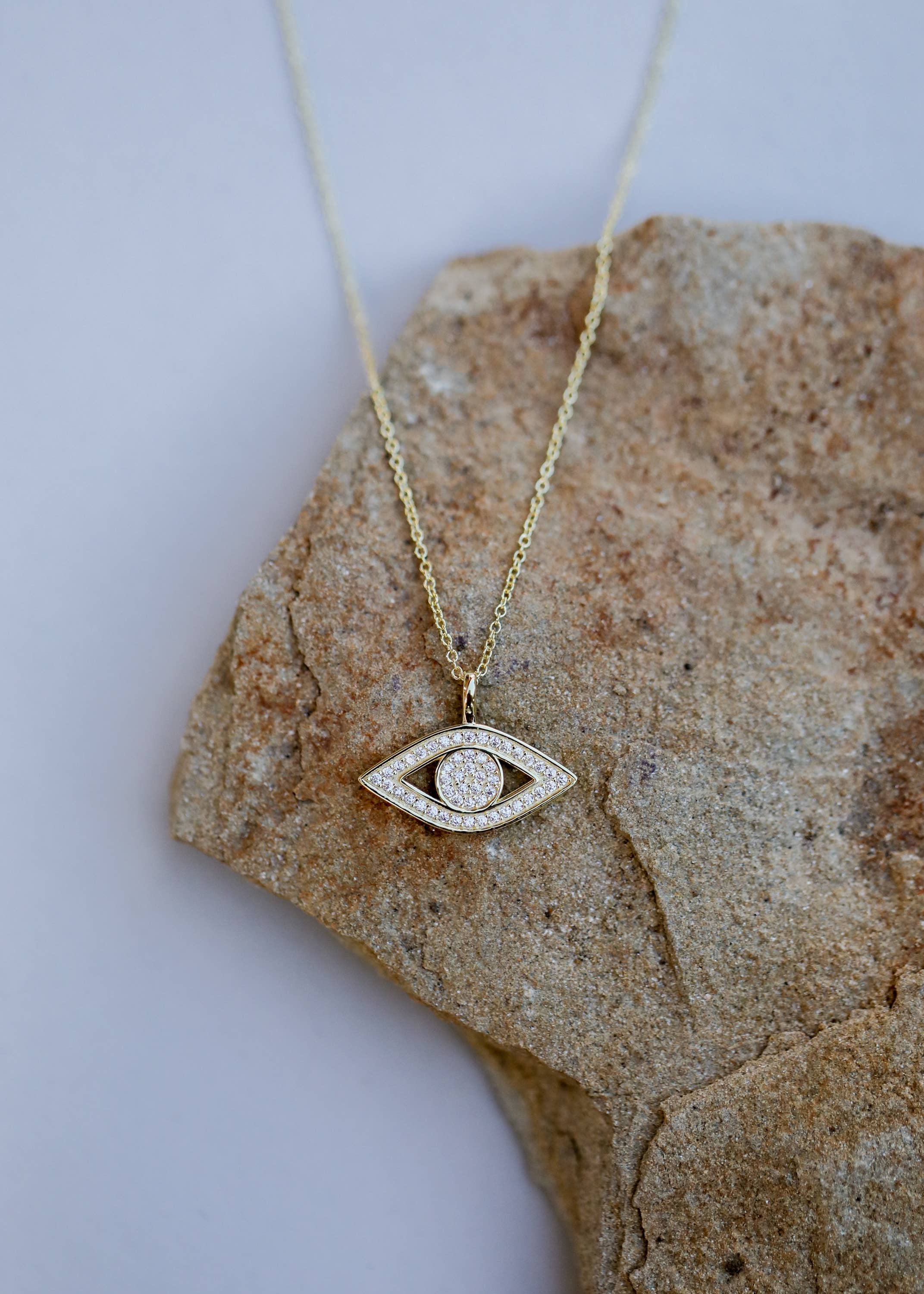 Pavé Evil Eye Necklace. Gold-plated, hypoallergenic & tarnish-resistant, featuring a CZ-encrusted charm for luck & protection