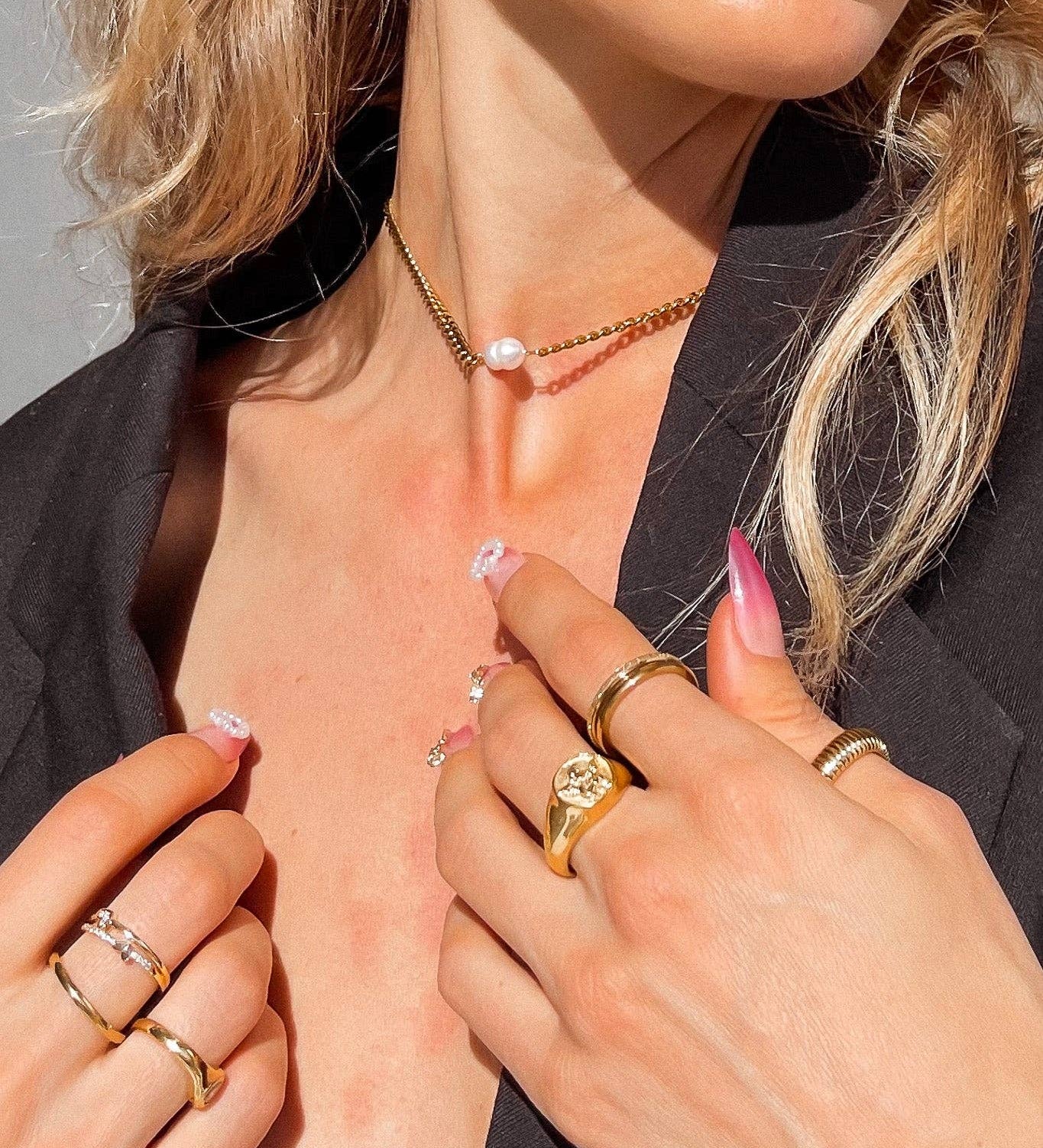 Three Sisters Stacking Ring Set features a trio of sleek & textured 18K gold-plated rings. Waterproof, hypoallergenic