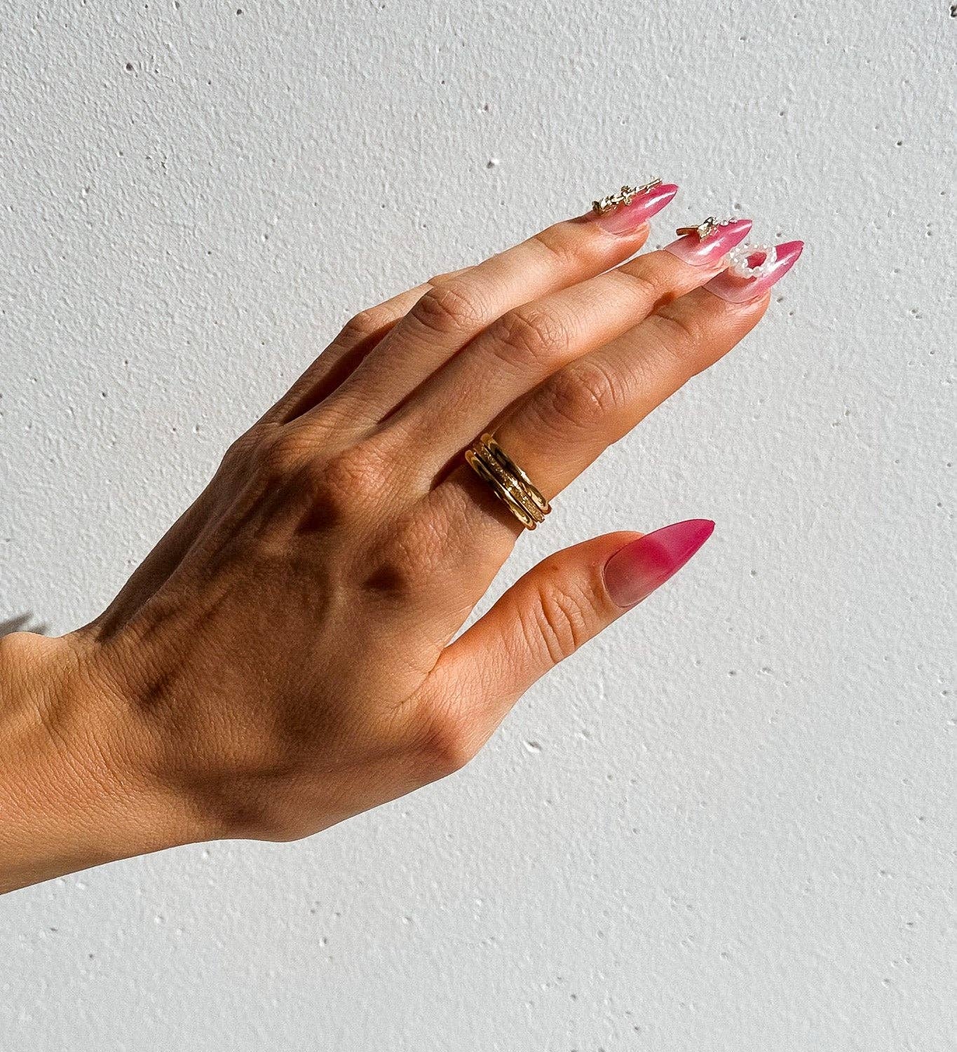 Three Sisters Stacking Ring Set features a trio of sleek & textured 18K gold-plated rings. Waterproof, hypoallergenic