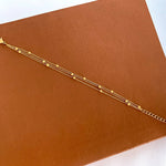 Trinity Layered Bracelet features three fine gold-plated chains. Hypoallergenic, tarnish-resistant & water-safe