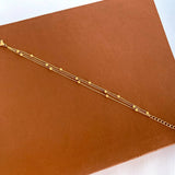 Trinity Layered Bracelet features three fine gold-plated chains. Hypoallergenic, tarnish-resistant & water-safe