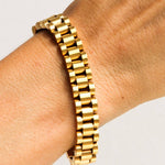 Link Chain Bracelet features a classic watch-link design in 18K gold-plated
